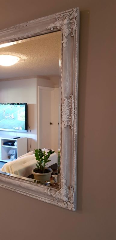 Mirror frame freshened with chalk paint