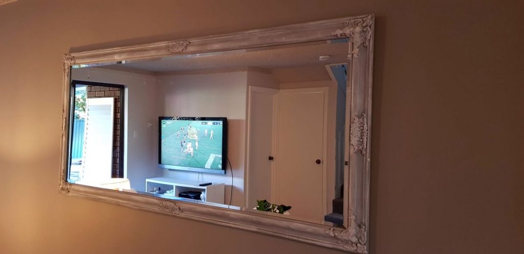 Mirror frame freshened with chalk paint