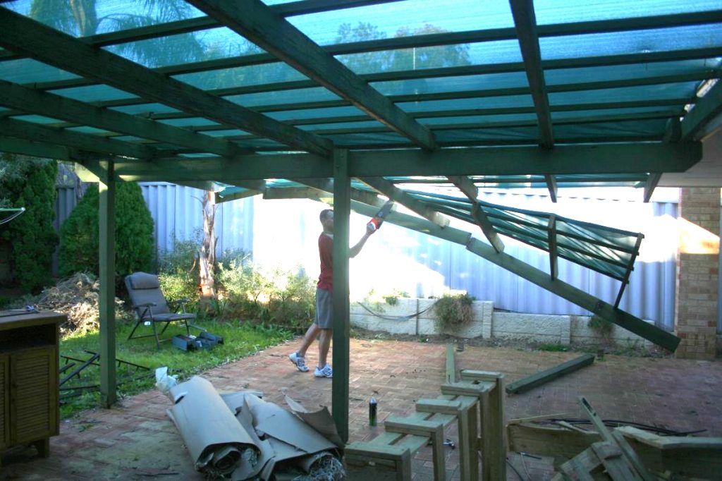 Demolition of old wooden structure during renovation