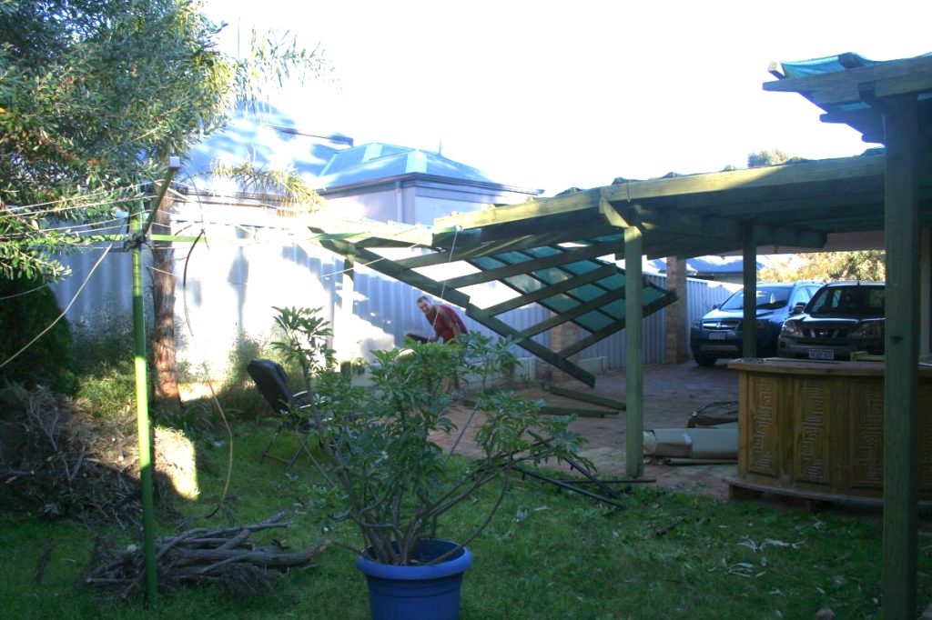 Demolition of old wooden structure during renovation