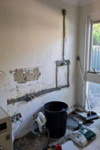 Walls prepped by a plumber ready for waterproofing