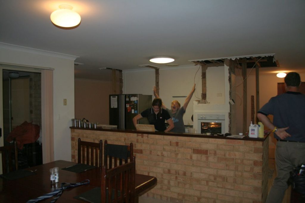 The demolition has started but at least its still functional - photo bombing child