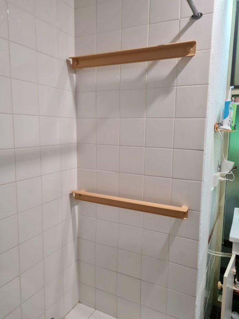 Removing all the old plastic rails and shelves